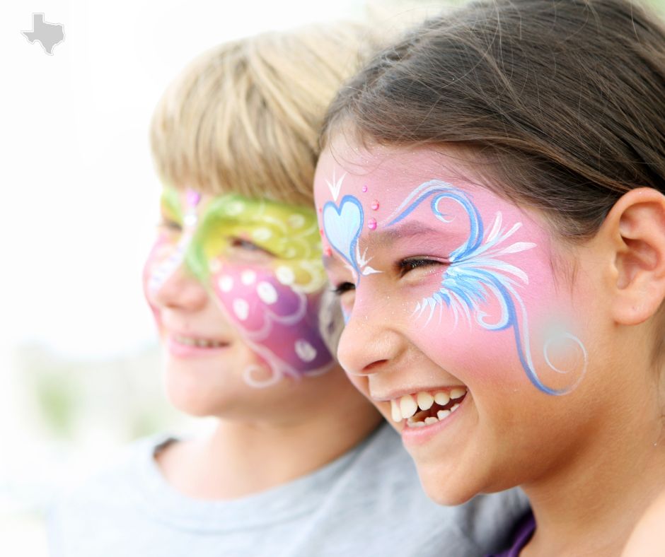 Face painting at a kids fall festival.